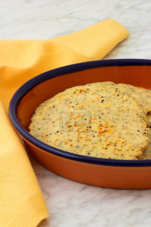 Photo for Handmade mexican corn tortillas mixed with chia seeds, quinoa and sesame seeds, healthy, delicious and nutritious super food. - Royalty Free Image