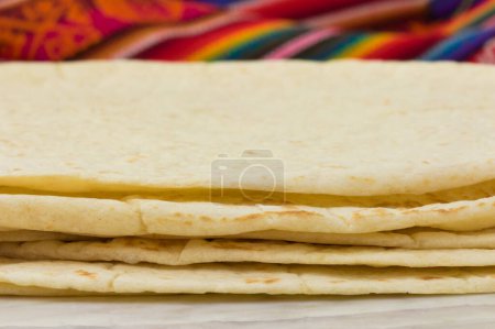 Photo for Handmade mexican wheat tortillas, perfect for burritos and delicious quesadillas. - Royalty Free Image