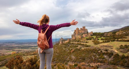 Photo for Happy woman looking at Loarre castle-  Huesca province in Spain- Aragon - Royalty Free Image