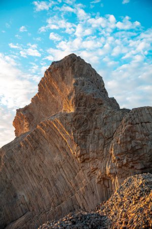 Foto de Rock formation volcanic vertical and blue sky - Imagen libre de derechos