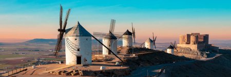 Téléchargez les photos : Windmill in Consuegra at sunset, Spain - en image libre de droit