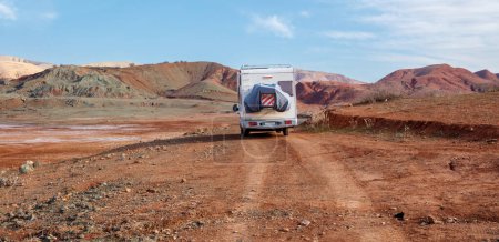Téléchargez les photos : Motor home driving in the road in Morocco- road trip, adventure in Morocco - en image libre de droit