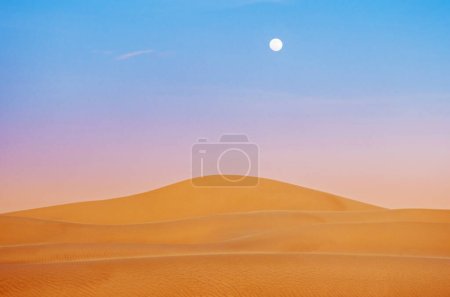 Photo for Sahara desert at sunset with moon in Morocco - Royalty Free Image