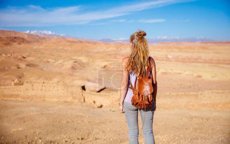 Photo for Traveller woman in desert landscape - Royalty Free Image