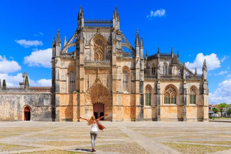 Photo for Woman tourist in front of The Monastery of Batalha- Portugal, Leiria- 2023 - Royalty Free Image