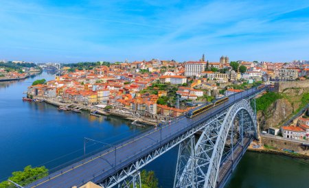 Photo for Panoramic cityscape of Porto- Portugal with famous Luiz Bridge and Douro river - Royalty Free Image