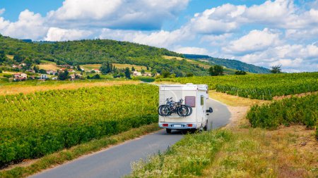 Photo for Motorhome in country road with vineyard- travel, tourism in France - Royalty Free Image