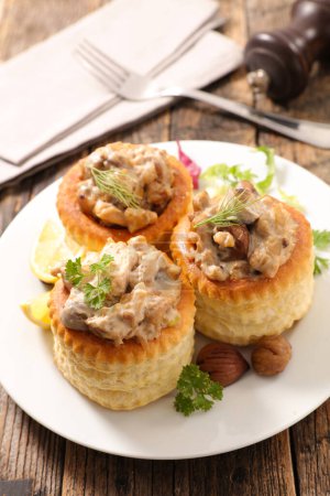 Photo for Savory puff pastry with cream and mushroom- vol au vent - Royalty Free Image