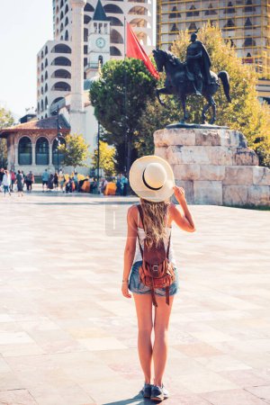 Photo for Woman tourist visiting center of Tirana city-Monument of Skanderbeg- Albania - Royalty Free Image