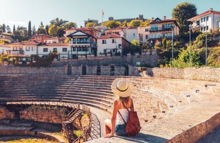 Photo for Travel destination, Tour tourism in Macedonia- Woman visiting roman theater in Ohrid city - Royalty Free Image