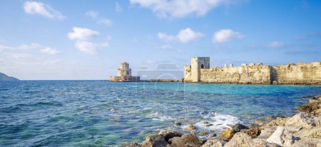 Photo for Panoramic view of The Bourtzi tower in Methoni Venetian Fortress in Peloponnese - Royalty Free Image