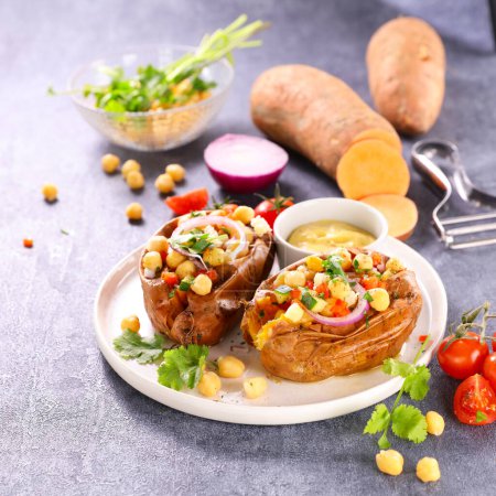 Photo for Baked sweet potato with vegetables - Royalty Free Image