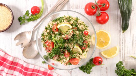 Photo for Tabbouleh salad with tomato, bell pepper, cucumber and parsley - Royalty Free Image