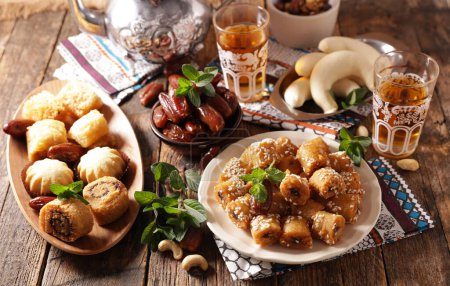 Photo for Tradional arabic dessert on wooden table - Royalty Free Image