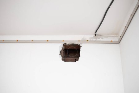 Photo for Fixing a for a stretch ceiling. - Royalty Free Image