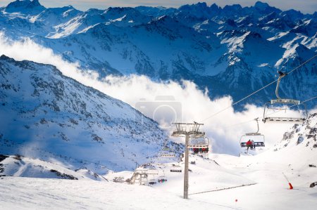 Photo for Ski lift in ski resort in winter Alps mountains, France. Val Thorens, France. Winter landscape - Royalty Free Image
