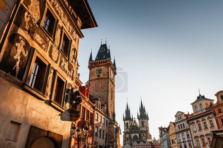 Old Town Square at sunrise in Prague, Czech Republic. Astronomical clock tower and Tyn church landmarks
