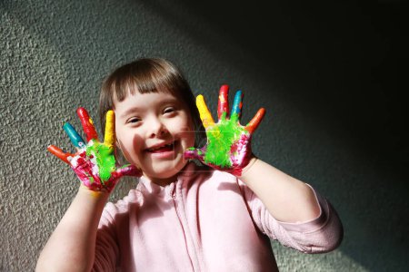 Photo for Cute little girl with painted hands - Royalty Free Image