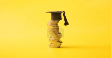 Photo for Graduated cap with coins on yellow background. Savings for education concept. - Royalty Free Image