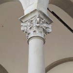 Florence, Italy, June 4, 2022: Cornthian column capital at the Opsedale degli Innocenti, the first building designed by Renaissance architect Filippo Brunelleschi and the beginning of the Renaissance in architecture.