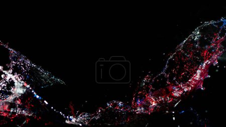 Foto de Salpicadura colorida de agua sobre fondo negro - Imagen libre de derechos