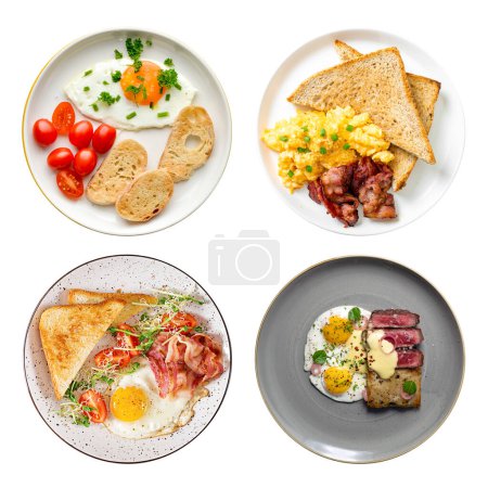 Foto de Conjunto de varios desayuno inglés con huevo frito o revuelto, tocino y verduras servidas en platos, vista superior aislada - Imagen libre de derechos