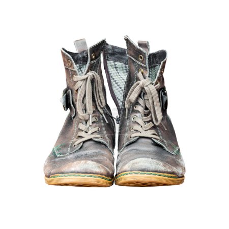 Foto de Pair of old worn out leather boots isolated, front view footwear cutout - Imagen libre de derechos