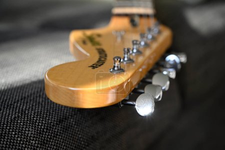 Photo for Christchurch, New Zealand - April 02, 2023: Stratocaster Fender Electric Guitar Head Stock Closeup 1 - Royalty Free Image