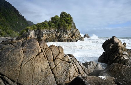 Photo for Huge Waves from the Tasman Sea Crash into rocks at Karamea, West Coast, New Zealand - Royalty Free Image