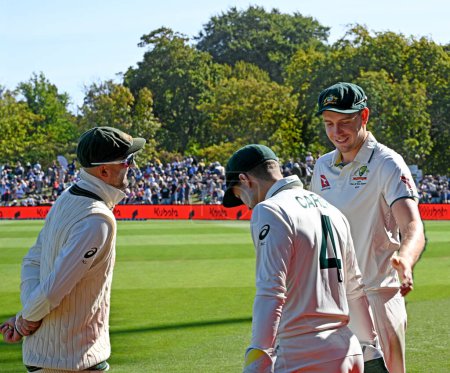 Photo for Christchurch, New Zealand  - March 10, 2024; Cricket - NZ vs Australia Test Match at the Hagley Oval. Lyons, Carey and Green having a laugh prior to the start of play on day three. - Royalty Free Image