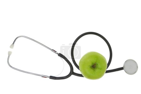 Photo for Green apple and medical stethoscope isolated on white transparent background - Royalty Free Image