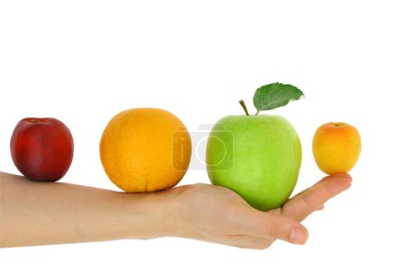 Photo for Healthy diet, Fresh fruits on a female hand isolated on white transparent background - Royalty Free Image