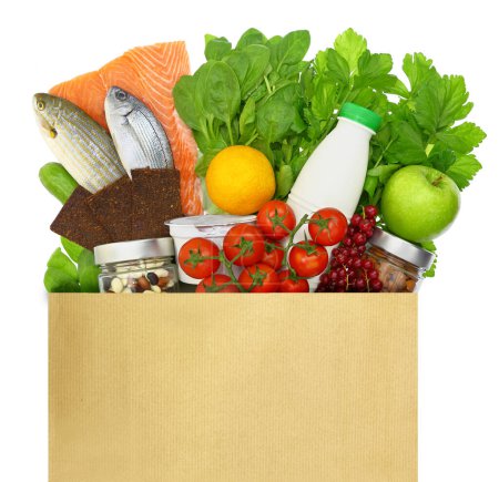 Photo for Fresh healthy groceries in a paper bag isolated on white transparent background - Royalty Free Image