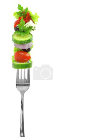 Photo for Fresh salad vegetables on a fork isolated on white transparent background, - Royalty Free Image