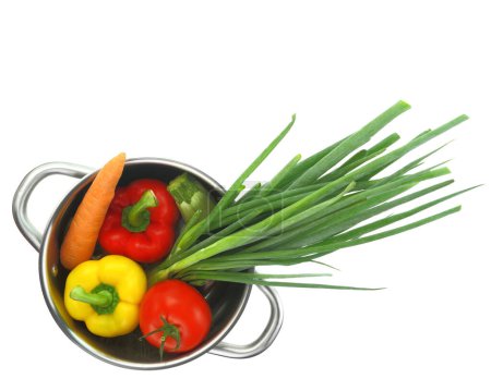 Photo for Fresh vegetables into a cooking pot isolated on white transparent background - Royalty Free Image