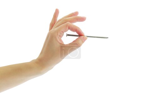 Photo for Female hand holding a nail isolated on white transparent background - Royalty Free Image