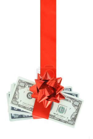 Photo for Money gift isolated on white transparent background, US dollars stack and red bow, festive present. - Royalty Free Image