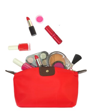 Photo for Cosmetics makeup products out of a red purse isolated on white transparent background - Royalty Free Image