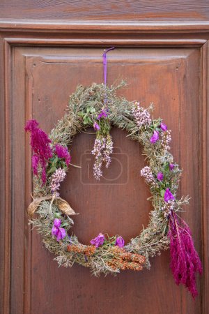 Photo for Natural Christmas Wreath Docoration on Wooden Door - Royalty Free Image