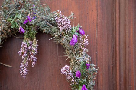 Photo for Natural Christmas Wreath Docoration on Wooden Door - Royalty Free Image