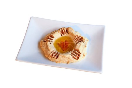 Photo for Plate of traditional hommos mezze view from above and isolated with clipping path - Royalty Free Image