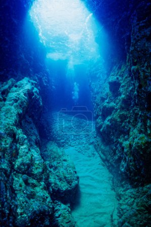 Photo for Italy, Mediterranean Sea, U.W. photo, Ponza Island;  a scuba diver in a cave (FILM SCAN) - Royalty Free Image