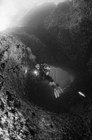 Photo for Italy, Mediterranean Sea, U.W. photo, Ponza Island;  a scuba diver in a cave (FILM SCAN) - Royalty Free Image
