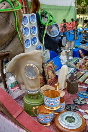 Photo for Bulgaria, Sofia, russian gadgets and gas masks for sale in a central market of the city - Royalty Free Image
