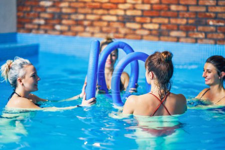 Photo for Group of woman in pool having training. High quality photo - Royalty Free Image