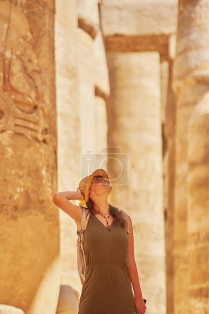 Photo for Tourist woman in Karnak Temple in Luxor Egypt. High quality photo - Royalty Free Image