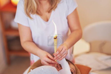 Photo for Picture of woman having candle therapy concha. High quality photo - Royalty Free Image