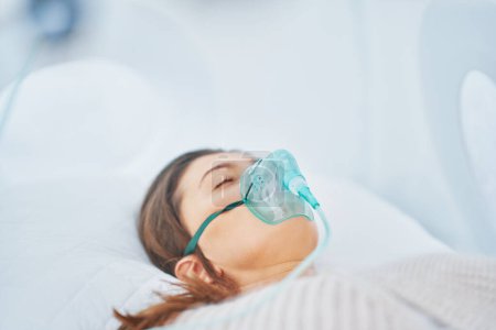 Picture of brunette woman in oxygen cabin. High quality photo
