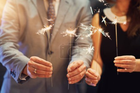 Photo for Photo of couple with New Year sparklers. High quality photo - Royalty Free Image
