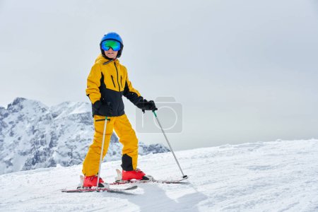 Photo for Picture of happy boy in skies Madonna di Campiglio. High quality photo - Royalty Free Image
